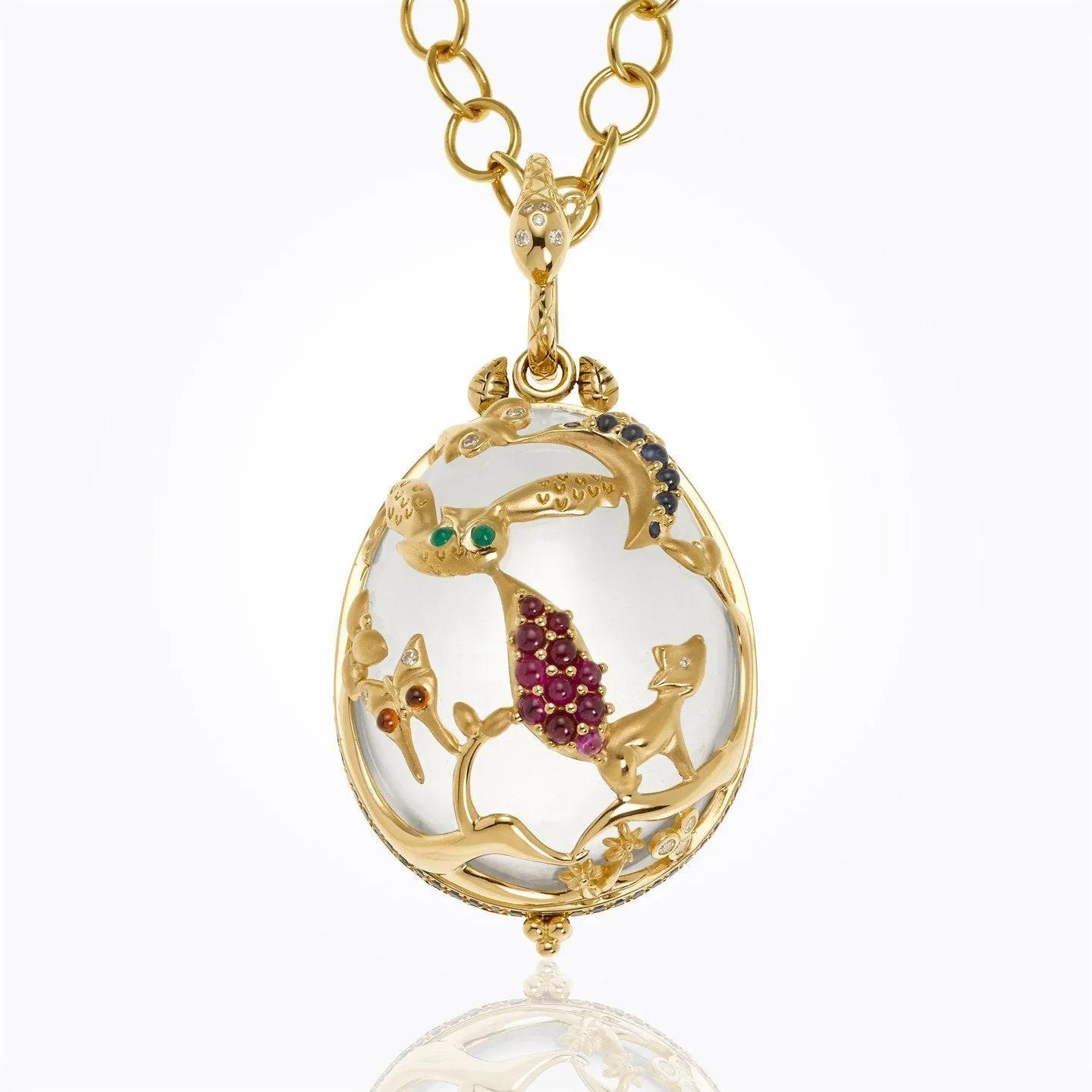 18K Nocturnal Pendant with rock crystal, blue sapphire, ruby, emerald, garnet and diamond